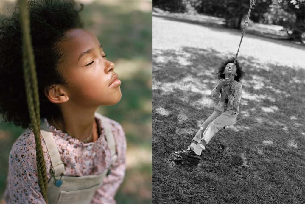 Children playing on a swing in a park, dressed in fashionable Massimo Dutti kids apparel, showcasing.