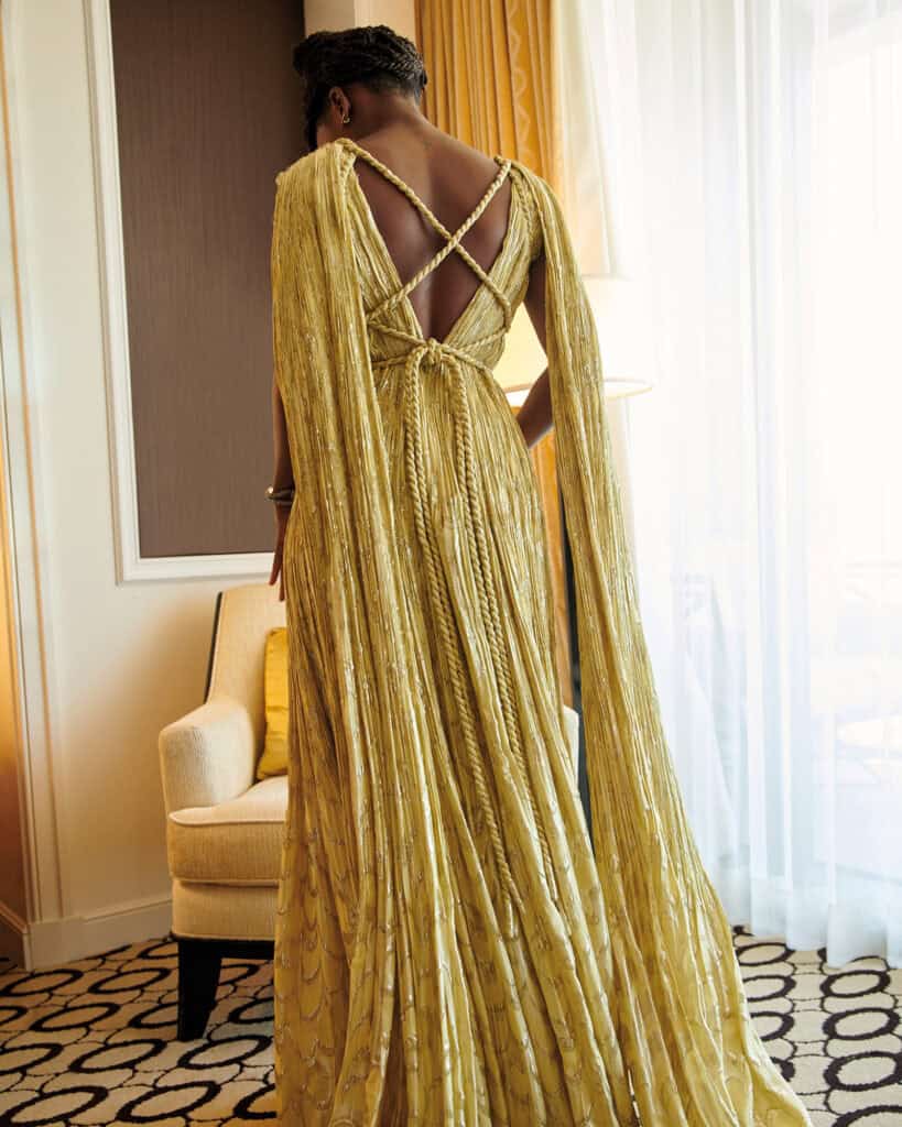Elegant gold gown with back details at Dior Critics Choice Awards.
