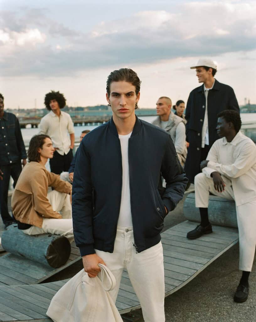 Modern men's fashion at Brooklyn waterfront, 2022.