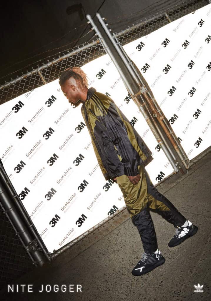 Urban model wearing Nike Nite Jogger sneakers for street style.