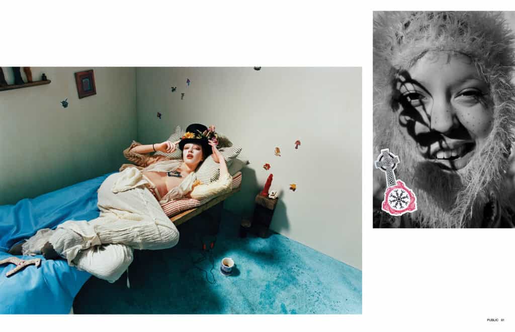 Artistic bedroom with a woman lying on the bed surrounded by whimsical wall decorations and colorful.