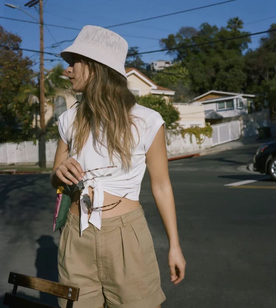 Stylish woman in casual summer outfit outdoors in Los Angeles.