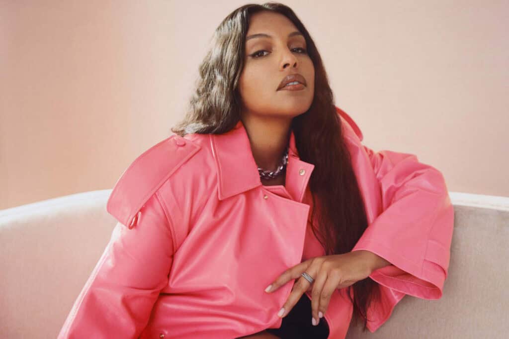 Porter Magazine feature with Paloma, styled in a pink outfit, showcasing fashion and beauty.