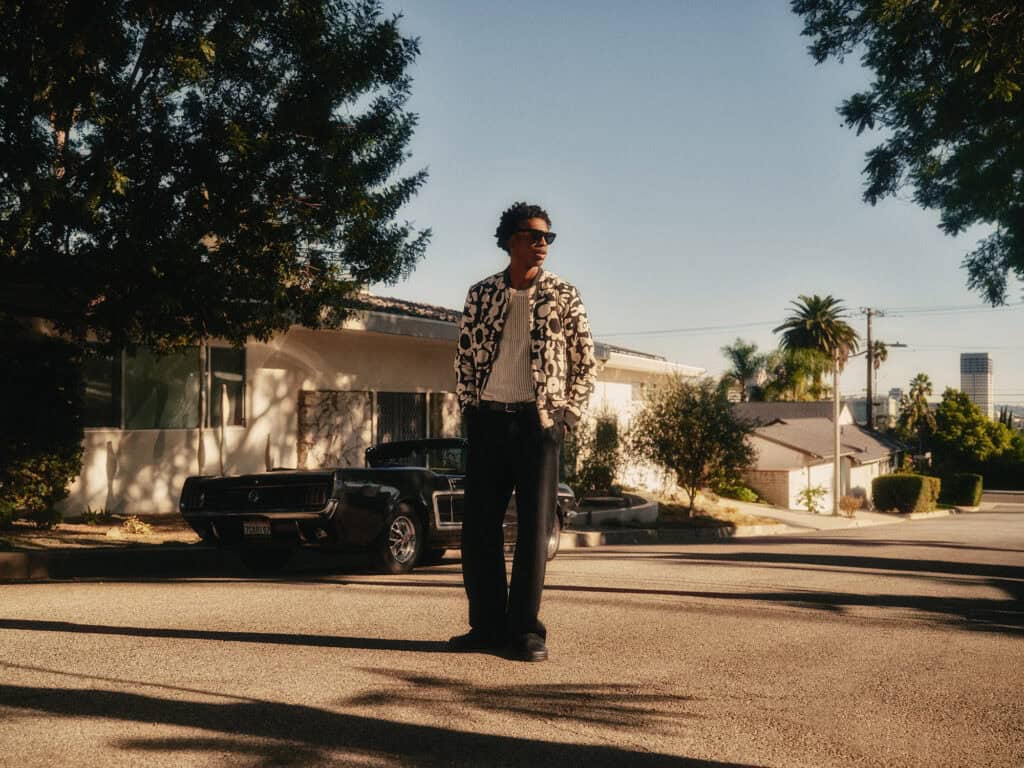 Stylish man wearing ZARA fashion in Los Angeles street scene.