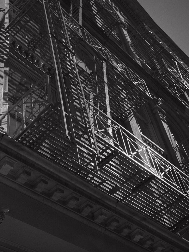 Urban fire escape in New York City building.