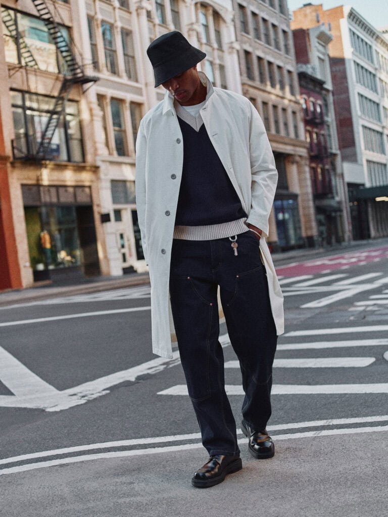 Man in ZARA outfit walking in New York City street, stylish urban fashion 2023.