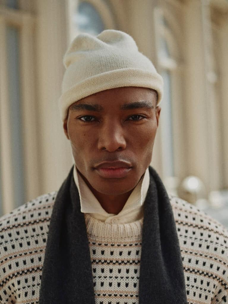 Young man in stylish winter outfit at ZARA MAN NYC 2023.