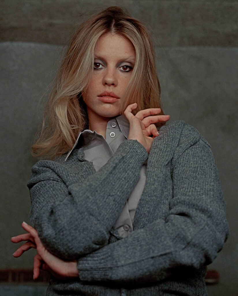 Mia Goth posing for Cultured Magazine, showcasing contemporary fashion and artistic expression.