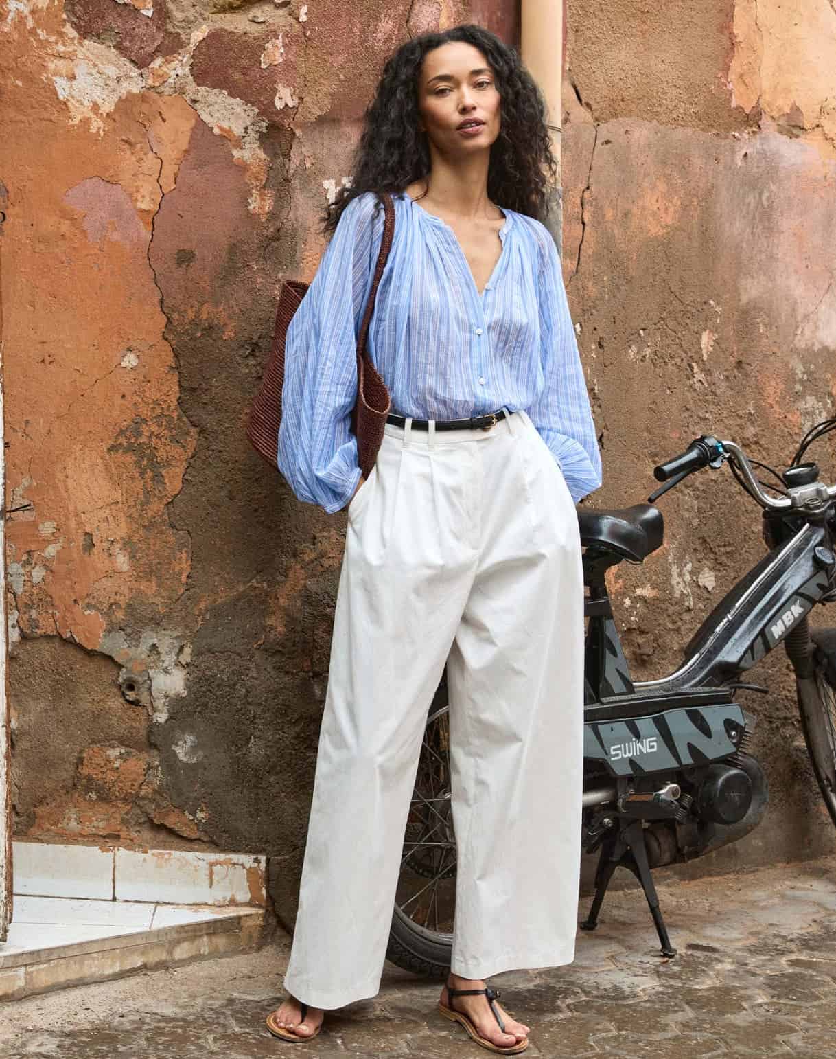 Elegant woman in Morocco with casual chic style.